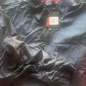 Nike Men's Black Windbreaker Jacket with Red Trim